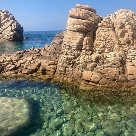 Residence Cala Rossa Isola Rossa Buitenkant foto